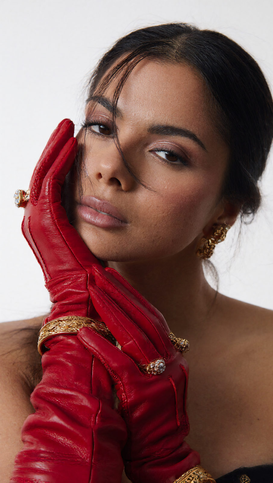 Young Hispanic Woman with Red Leather Gloves Portrait