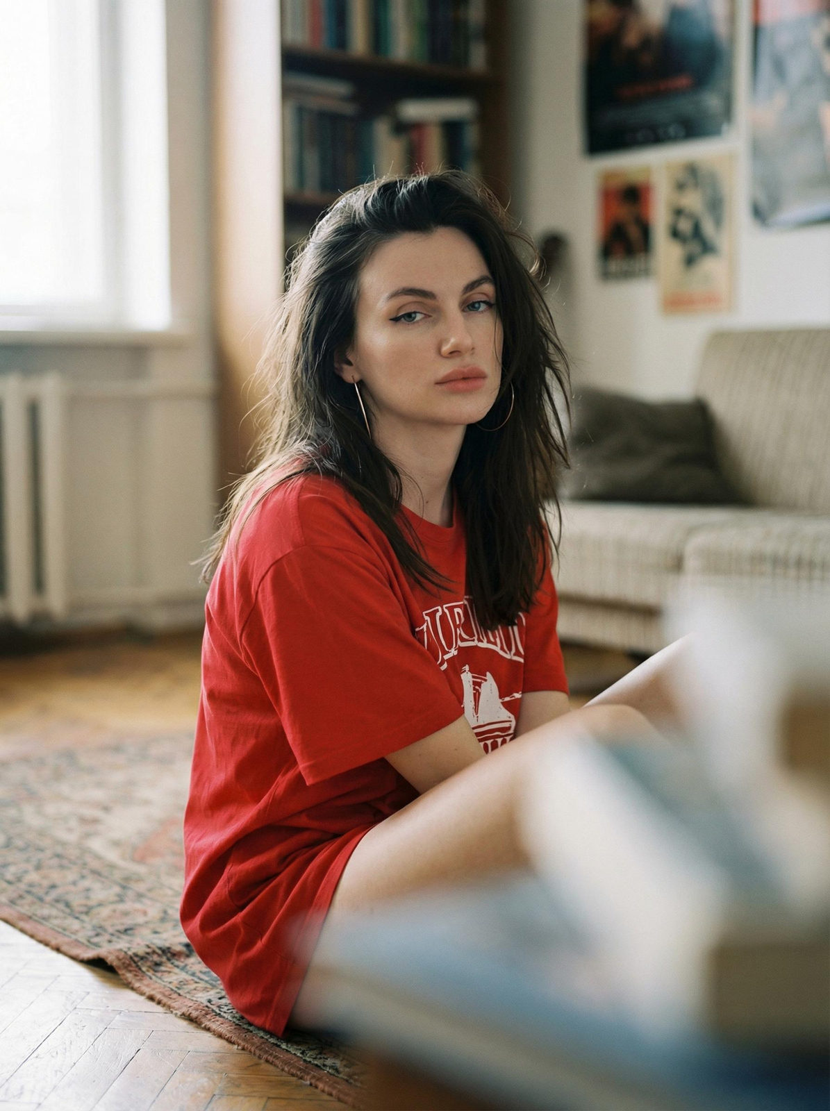 Seated Woman in Red T-Shirt Portrait