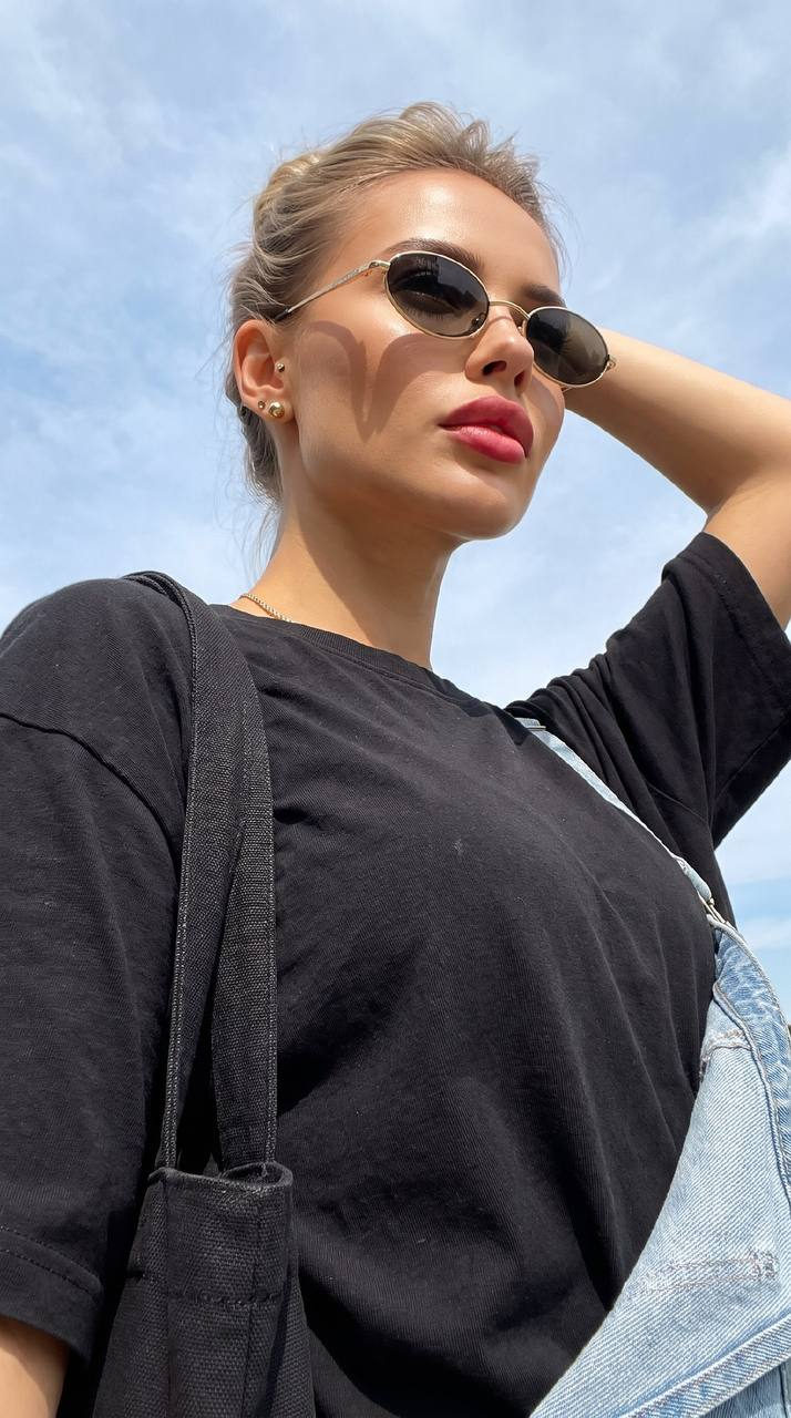 Sunlit Oval Glasses Portrait