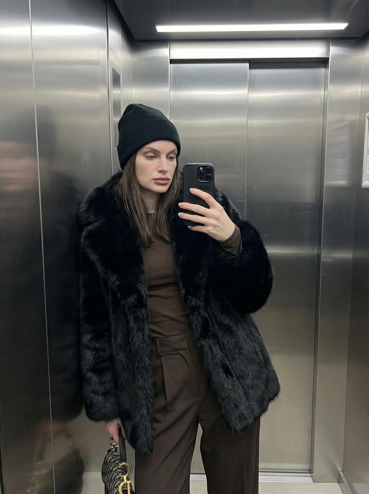 Black Fur Coat Elevator