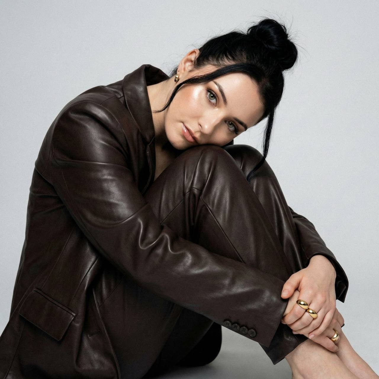 Elegant Woman Portrait in Leather Suit