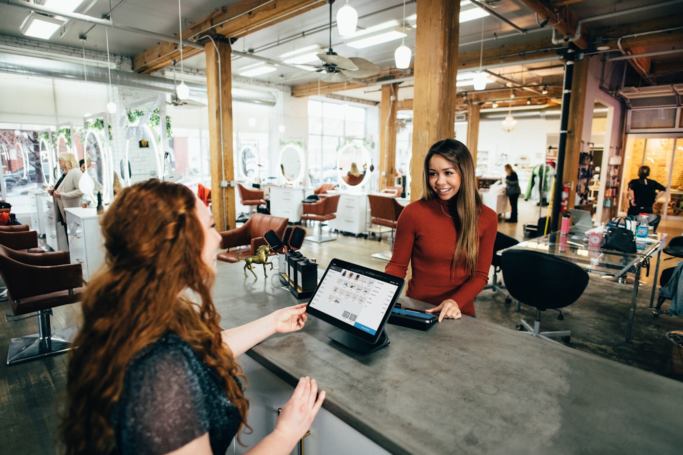 Woman shopping online on laptop — lifestyle context in the ecommerce funnel