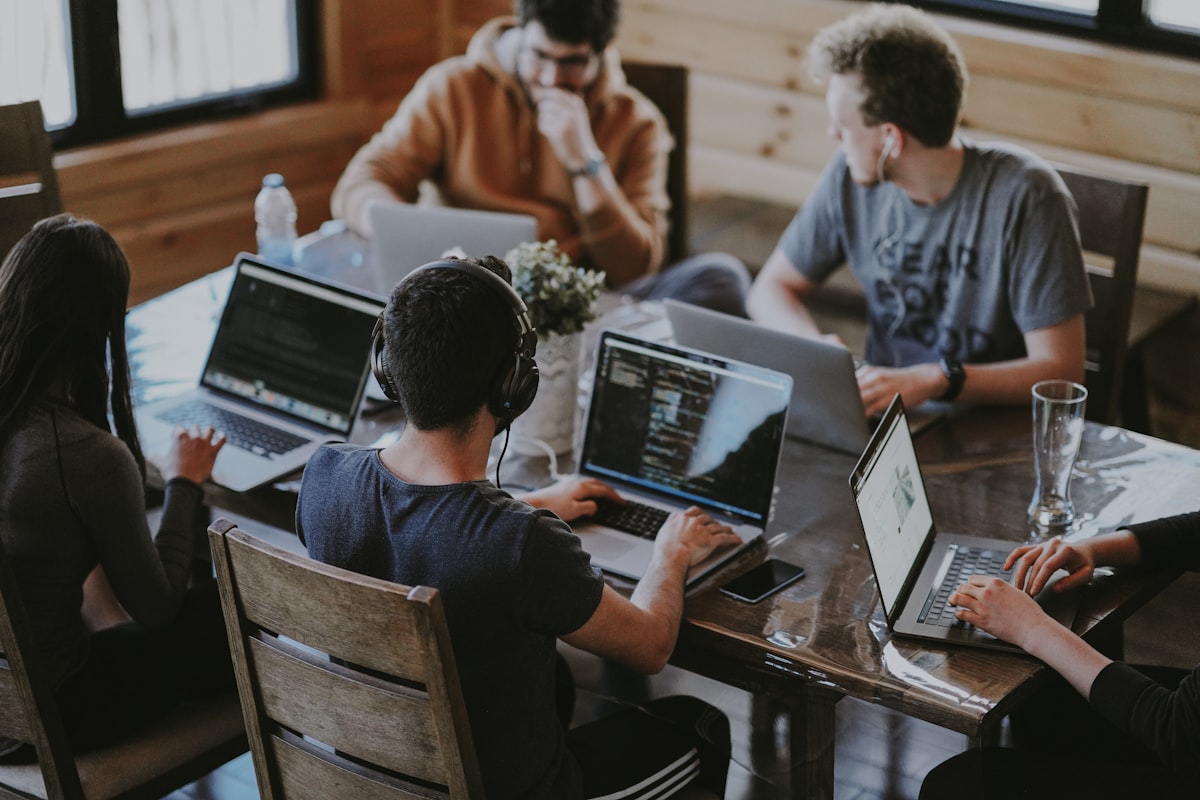 Ecommerce team reviewing AI-generated product images on unified creative workspace